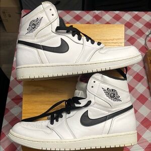 Nike Air Jordan High-Tops in White with Black and Red Accents